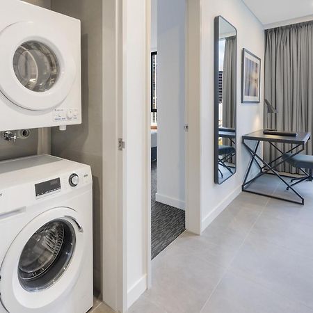 Meriton Suites מלבורן מראה חיצוני תמונה Laundry facilities in a typical apartment