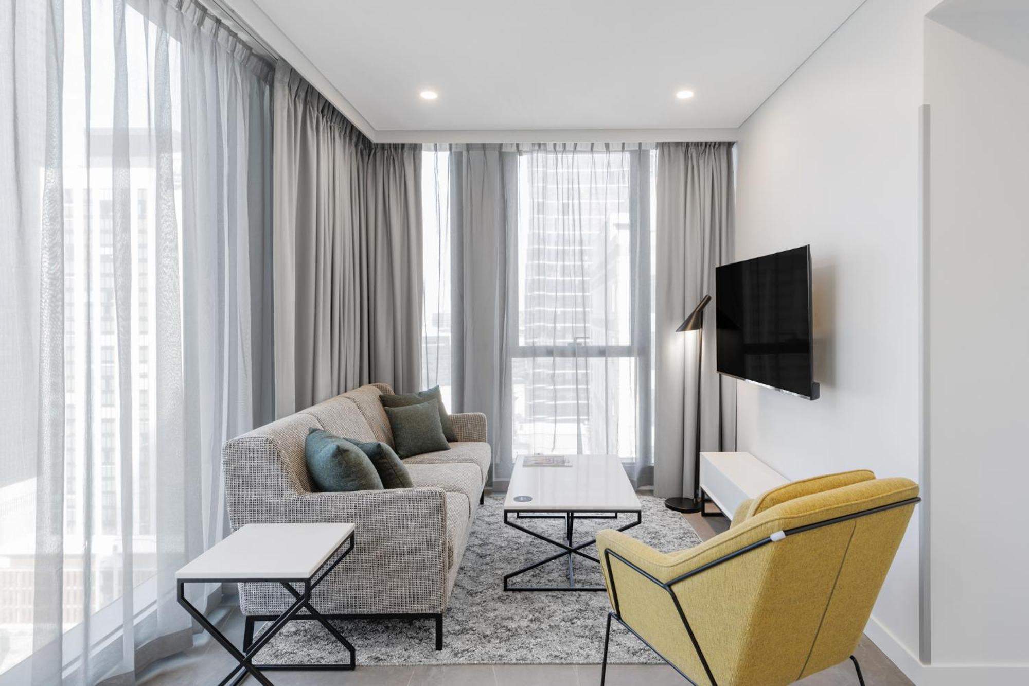 Meriton Suites מלבורן מראה חיצוני תמונה A living room in a typical apartment